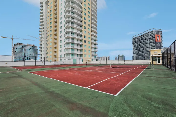 Tennis with surrounding walking & jogging path.