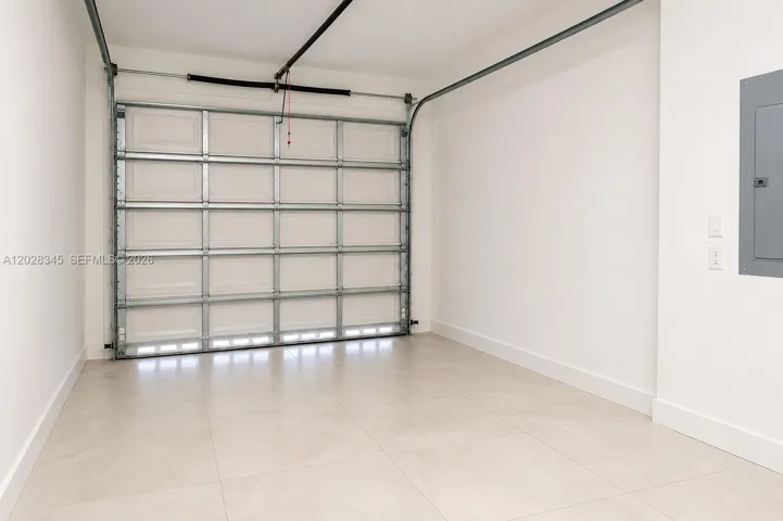 Tiled Garage. Virtually Emptied.