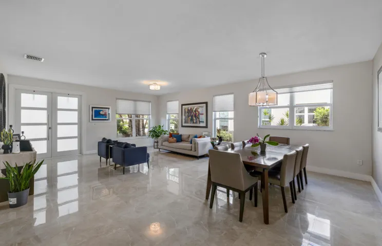 Huge Living/Dinning area with Spanish porcelain floors.
