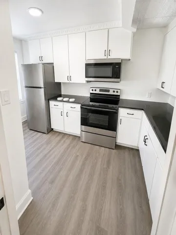 This image has been digitally enhanced using AI to improve lighting and brightness. No material features of the property were intentionally added, removed, or altered.