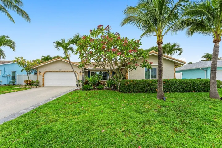 Front with 2 car garage