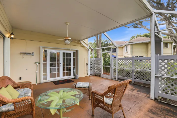Enjoy the outdoors while staying dry and protected from insects in the screened patio. It's the perfect space to relax and enjoy the Florida lifestyle year-round.