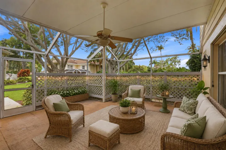 This cozy screened patio extends your living space outdoors and provides the perfect spot to enjoy Florida's beautiful weather year-round