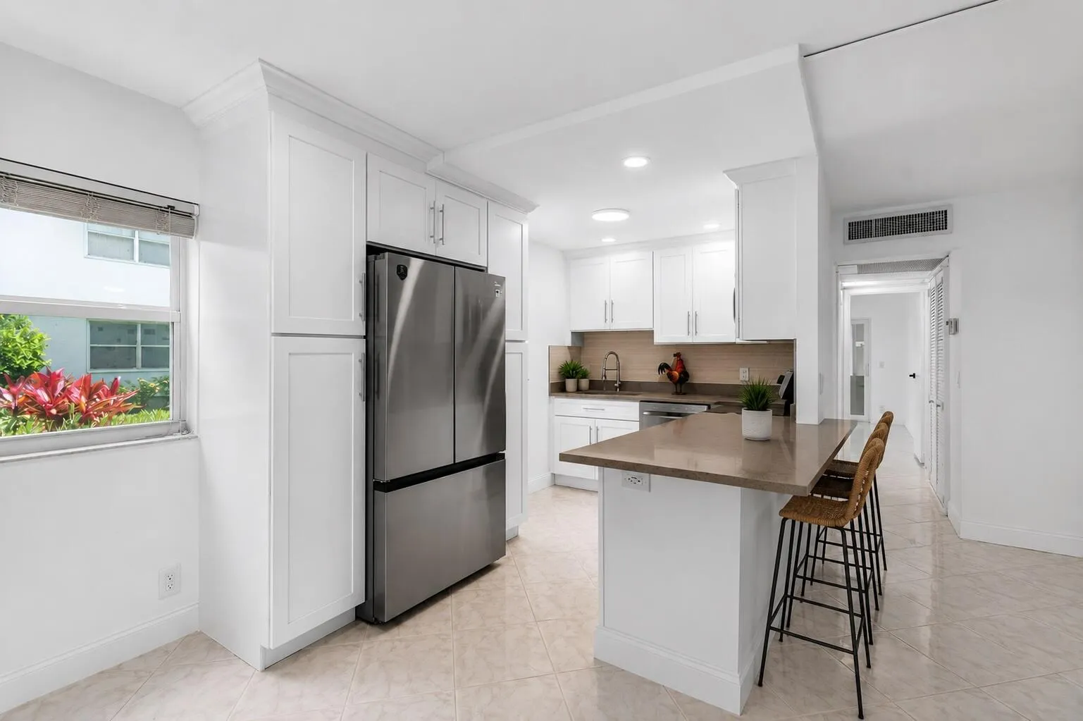 Kitchen and bar area 2 virtually staged
