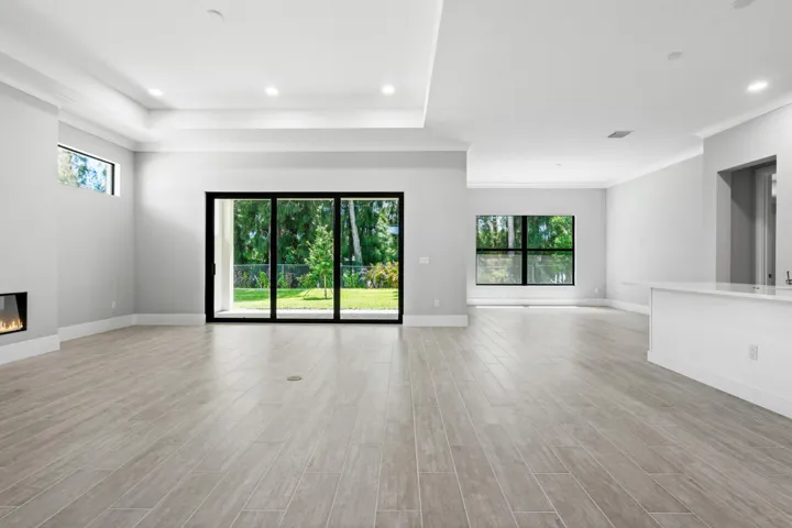 Great Room and Dining to Backyard