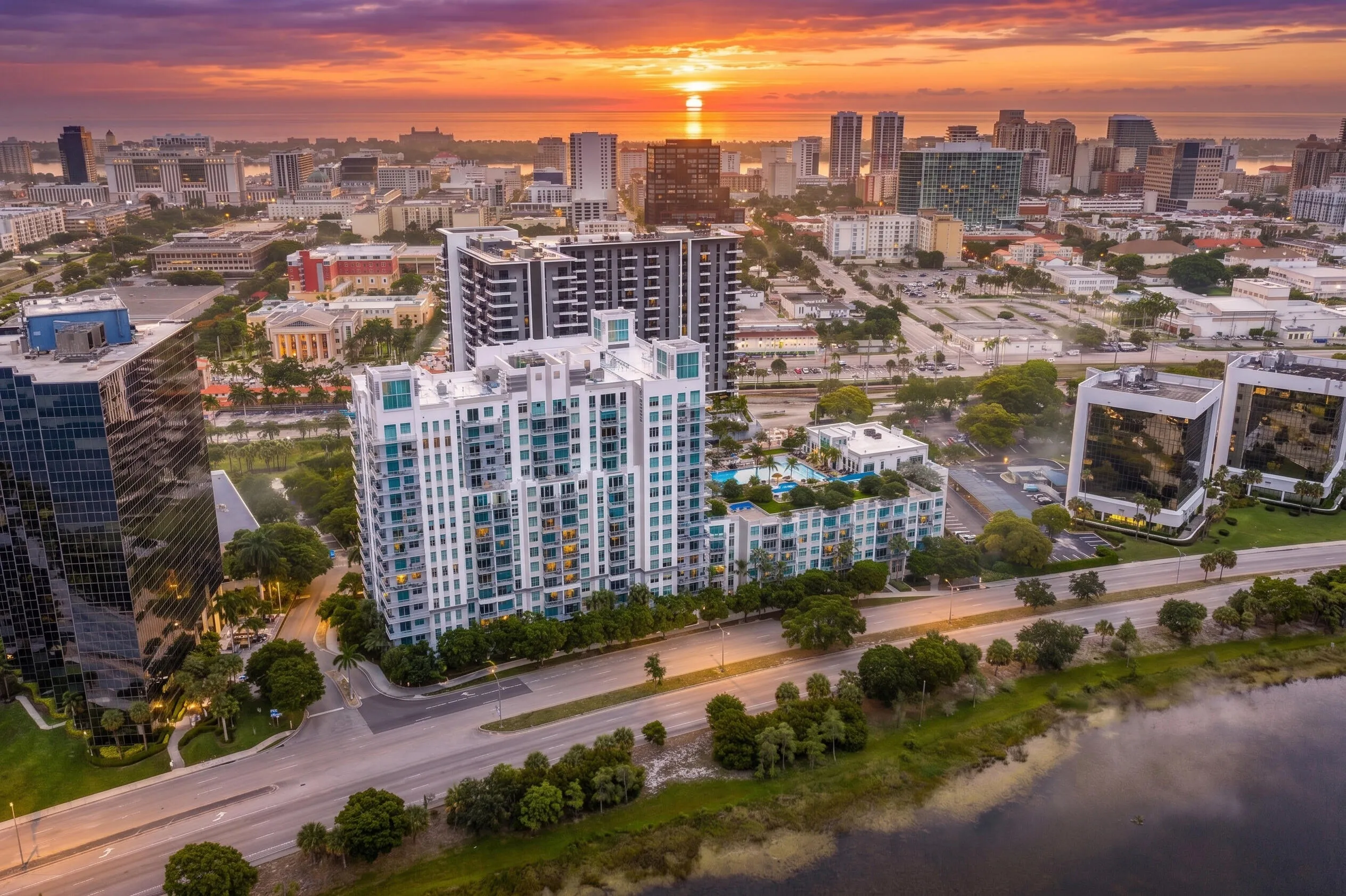 Residents enjoy a 24-hour attended lobby, resort-style pool and spa, fitness center, clubhouse, business center, media room, billiards room, and outdoor gathering spaces—all just moments from Brightline, CityPlace, the Kravis Center, Palm Beach Island, and Downtown West Palm Beach.