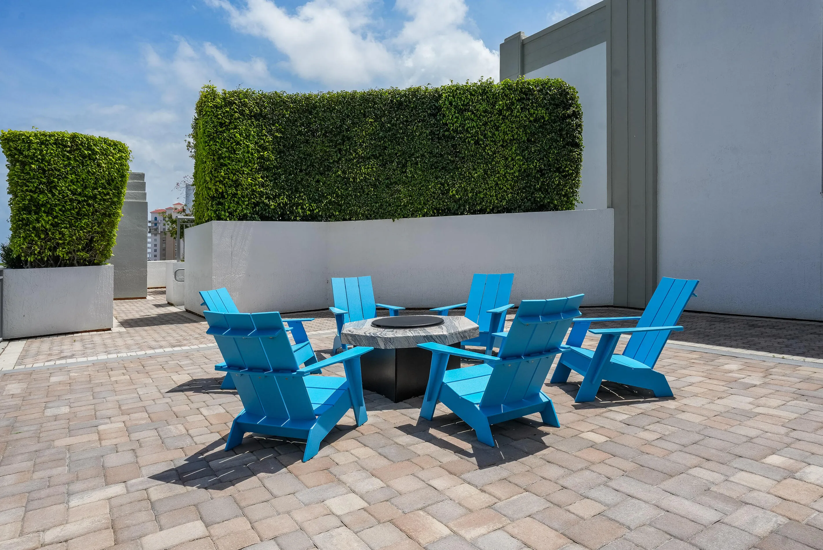 Residents enjoy a 24-hour attended lobby, resort-style pool and spa, fitness center, clubhouse, business center, media room, billiards room, and outdoor gathering spaces—all just moments from Brightline, CityPlace, the Kravis Center, Palm Beach Island, and Downtown West Palm Beach.