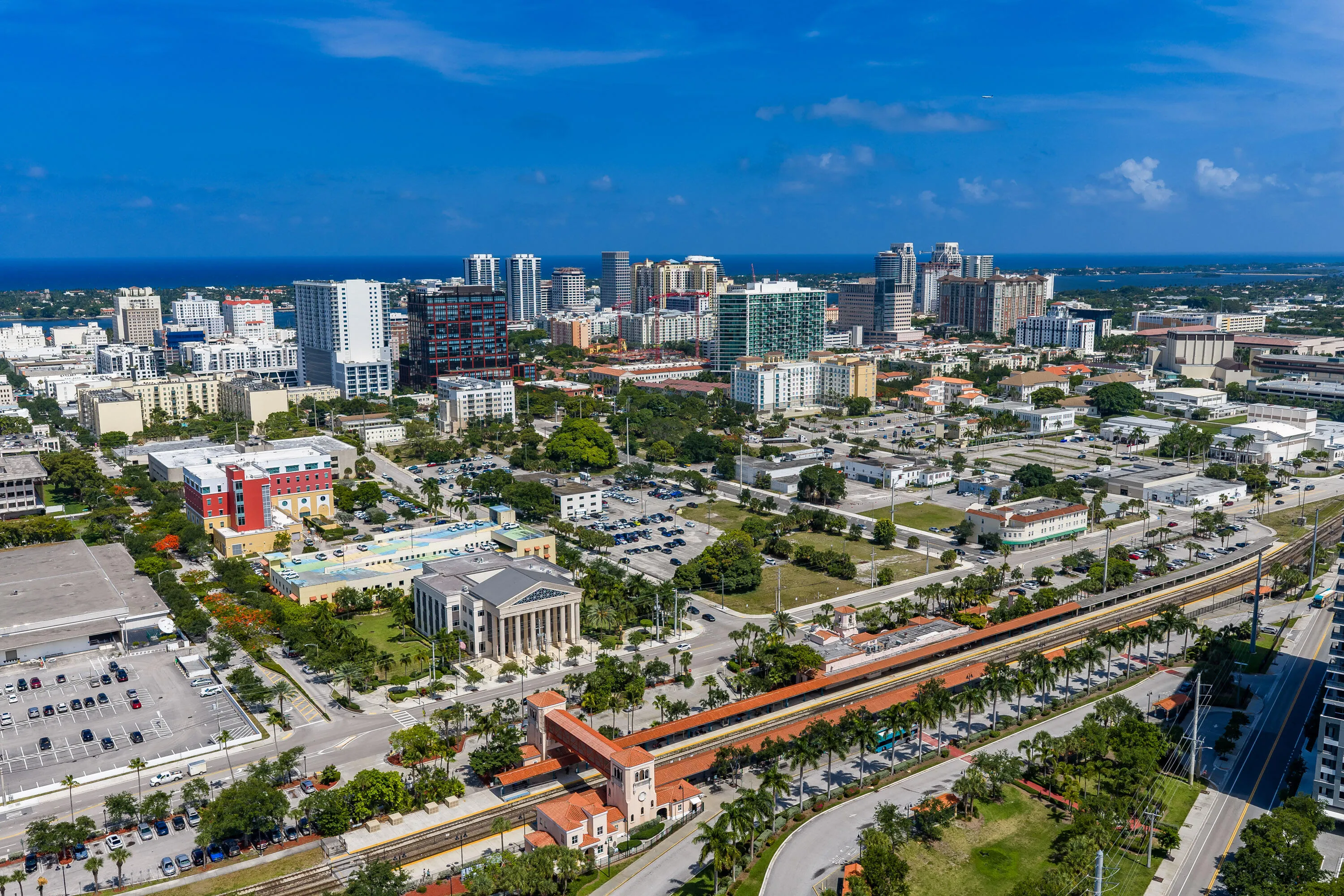 Residents enjoy a 24-hour attended lobby, resort-style pool and spa, fitness center, clubhouse, business center, media room, billiards room, and outdoor gathering spaces—all just moments from Brightline, CityPlace, the Kravis Center, Palm Beach Island, and Downtown West Palm Beach.
