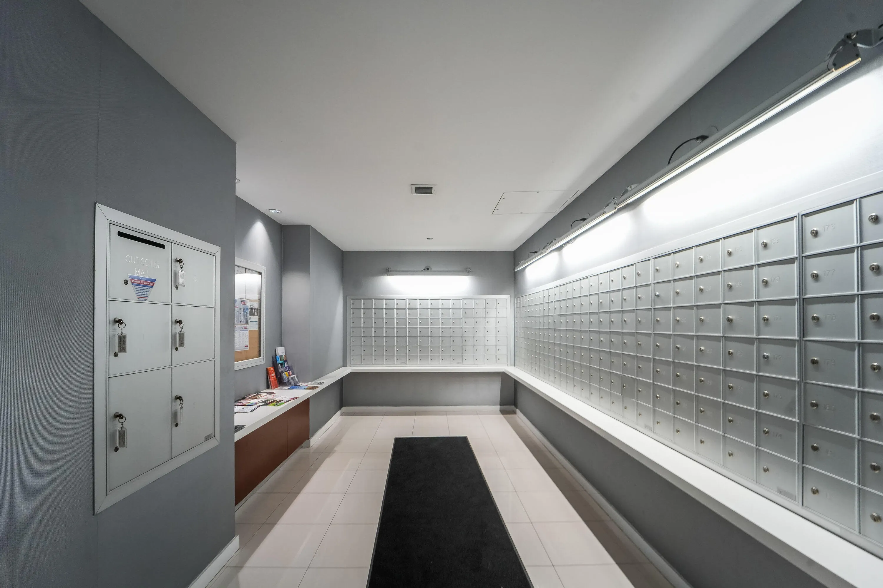 Mail room with Amazon Hub package lockers