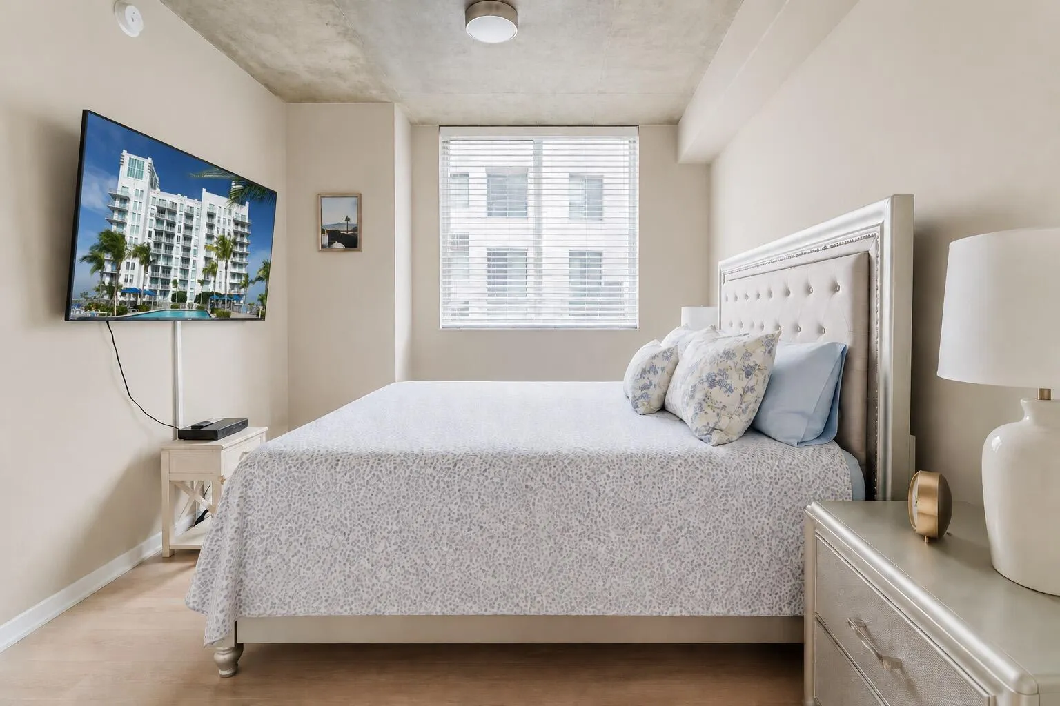 Furnished primary suite with custom closet system