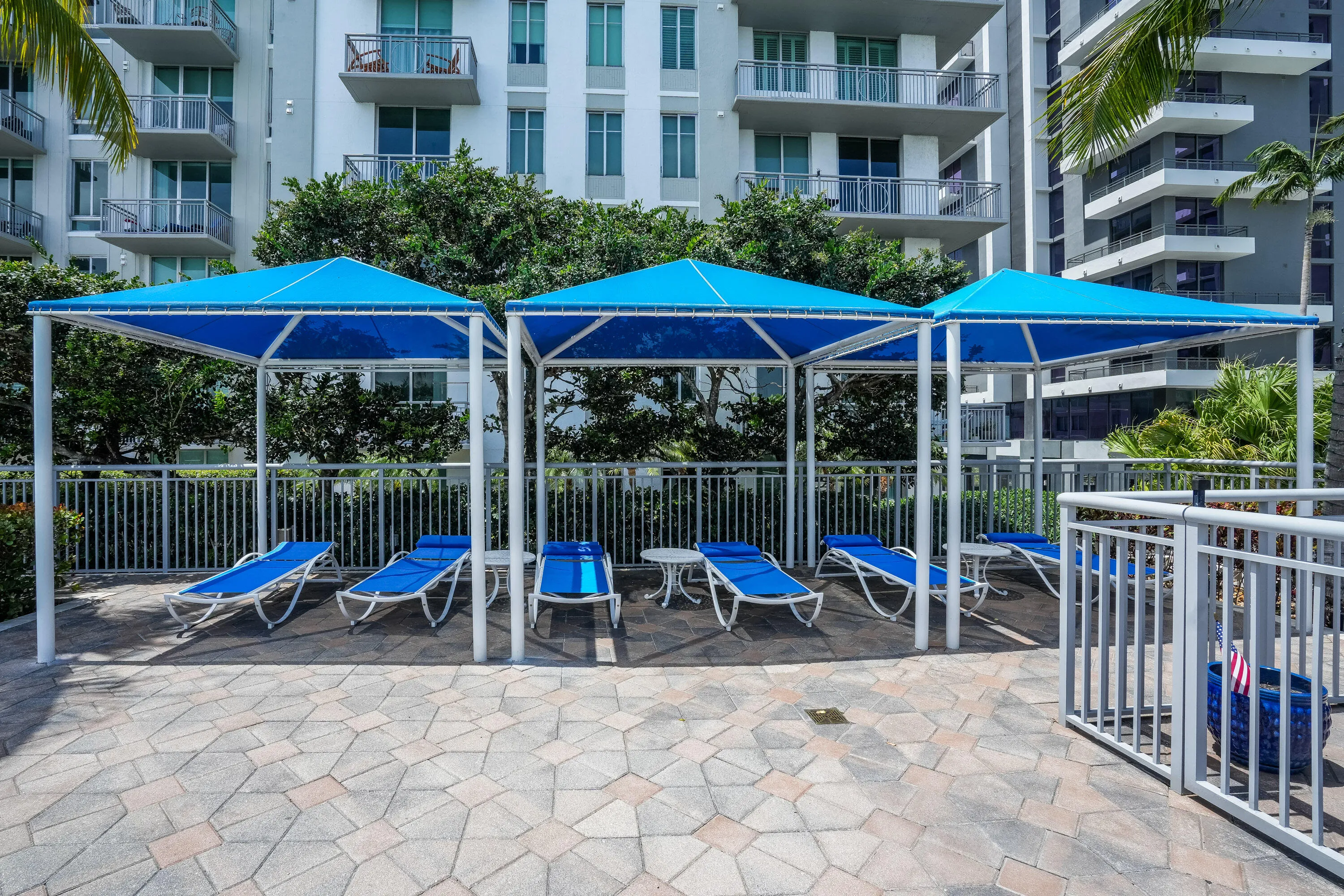 Residents enjoy a 24-hour attended lobby, resort-style pool and spa, fitness center, clubhouse, business center, media room, billiards room, and outdoor gathering spaces—all just moments from Brightline, CityPlace, the Kravis Center, Palm Beach Island, and Downtown West Palm Beach.
