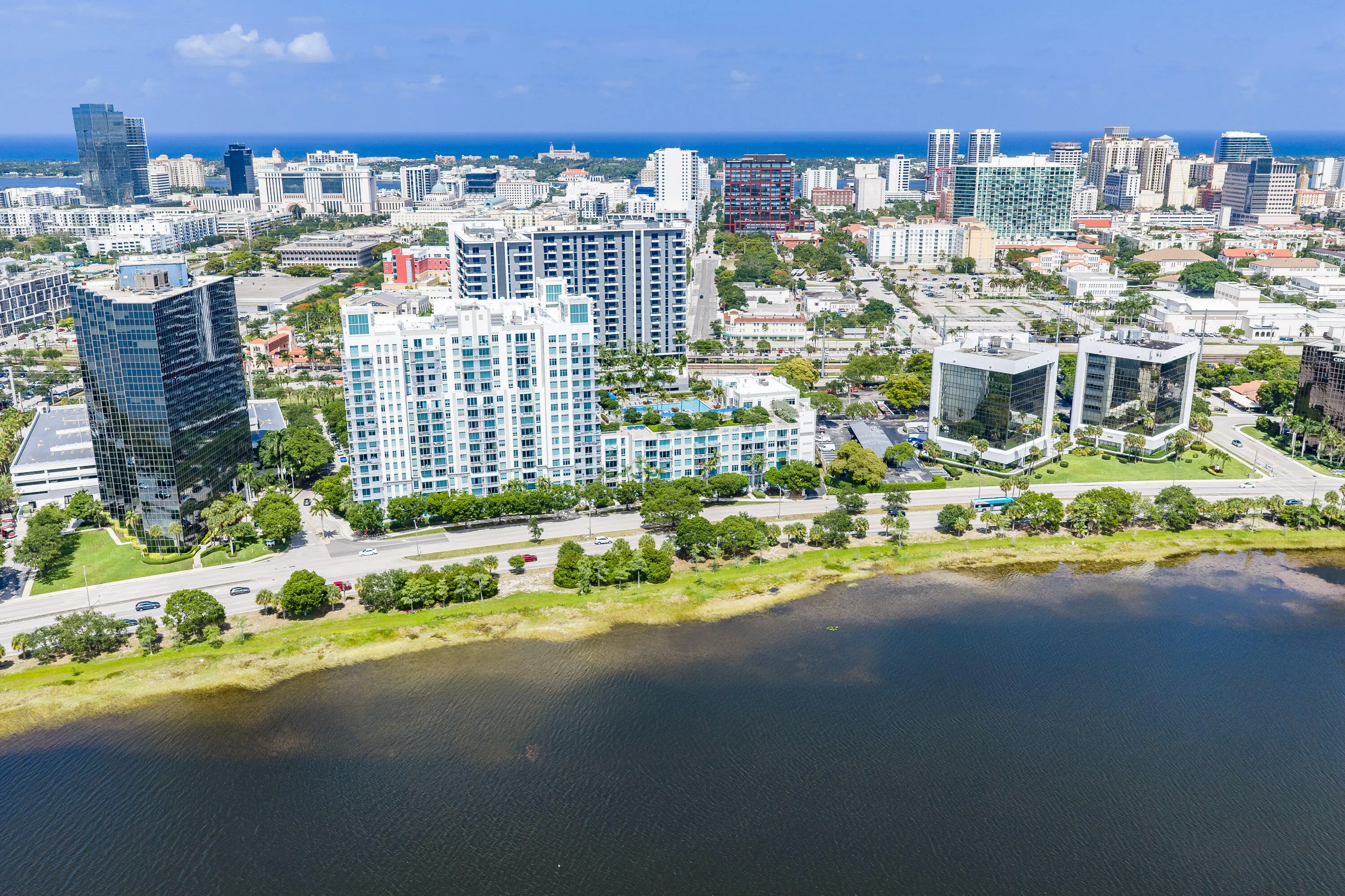 Residents enjoy a 24-hour attended lobby, resort-style pool and spa, fitness center, clubhouse, business center, media room, billiards room, and outdoor gathering spaces—all just moments from Brightline, CityPlace, the Kravis Center, Palm Beach Island, and Downtown West Palm Beach.