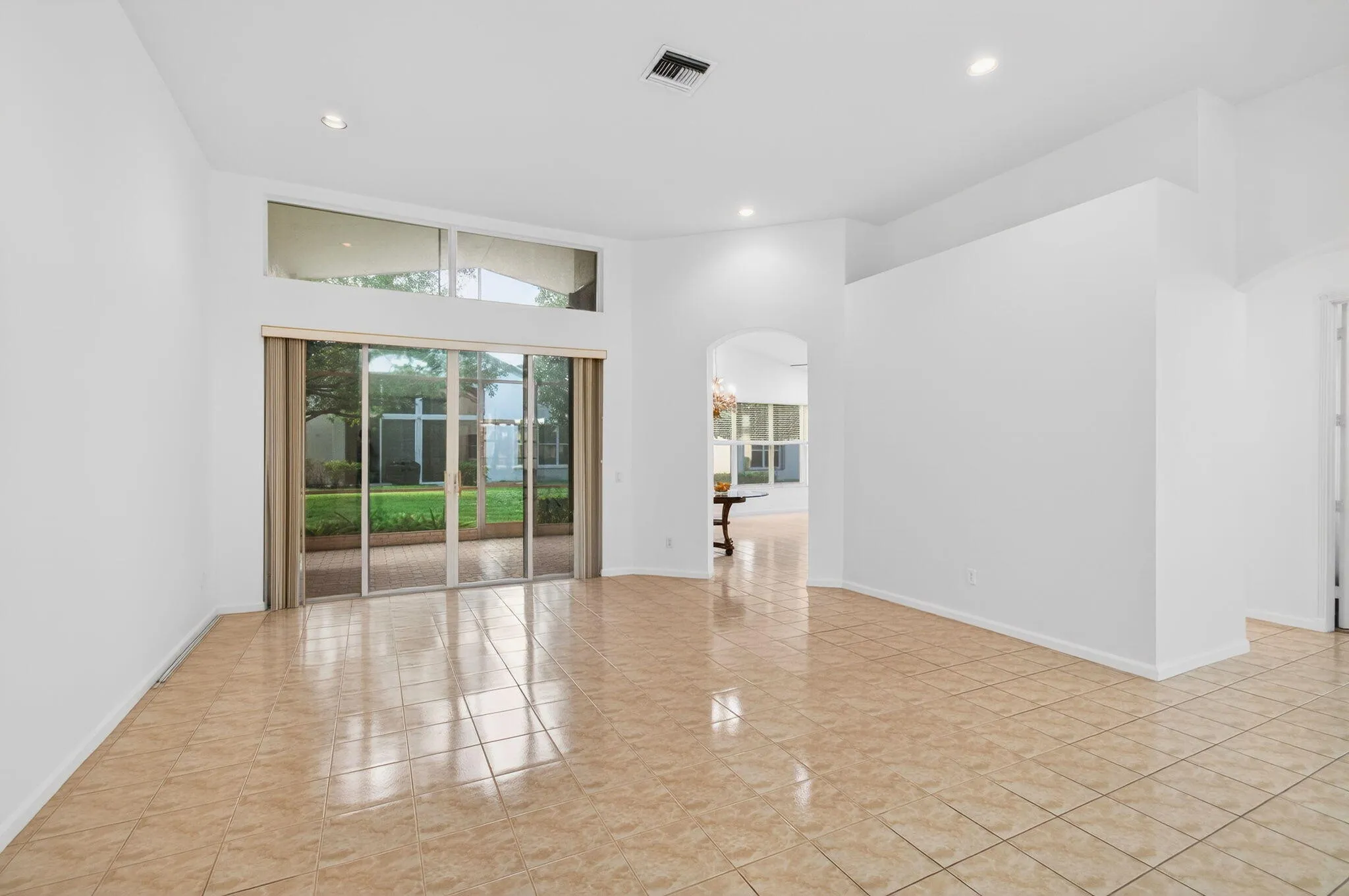 Living Room is open to Family Room and Kitchen