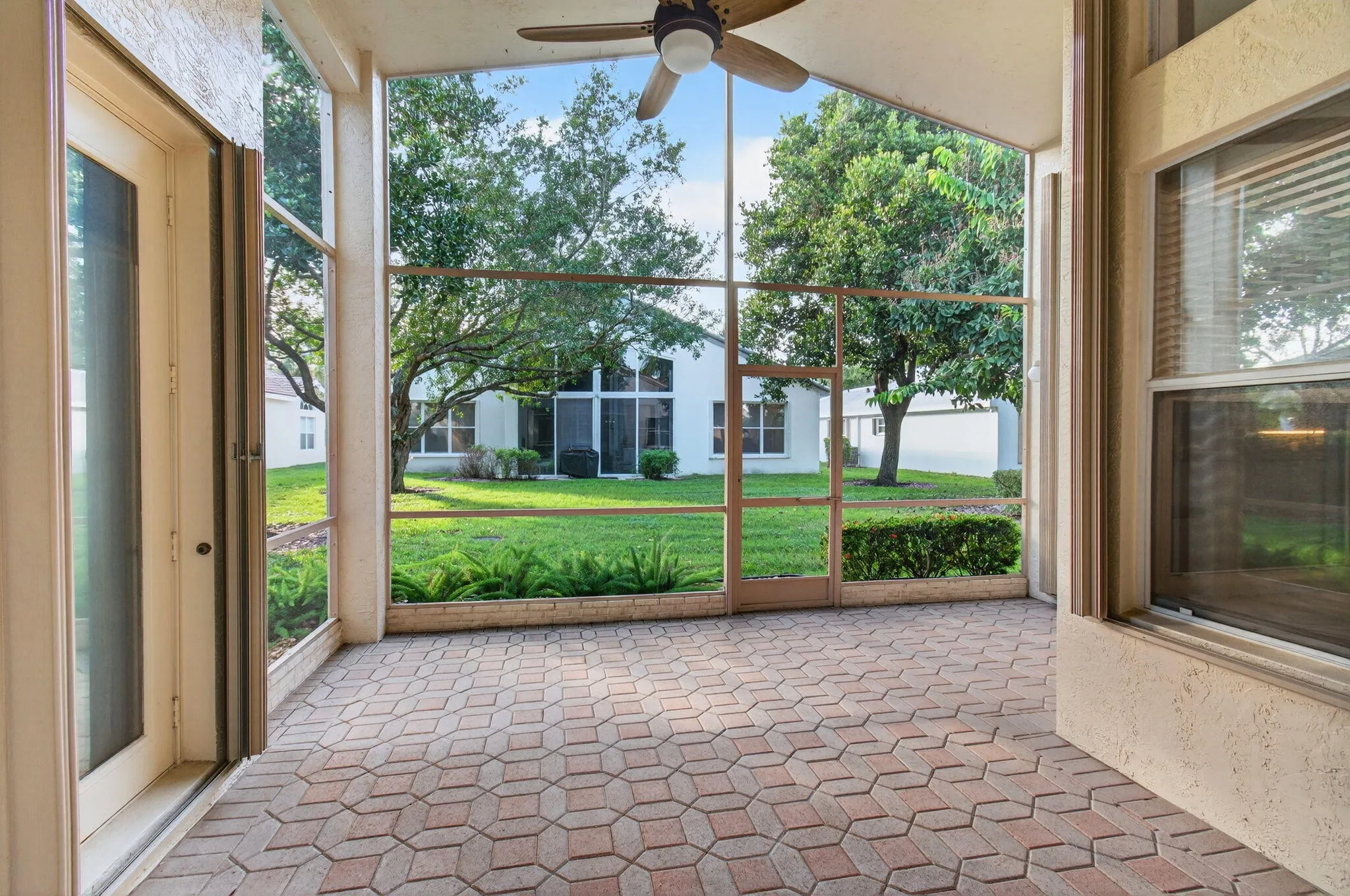 Lanai has entry doors from Primary Bedroom, Living Room and Family Room