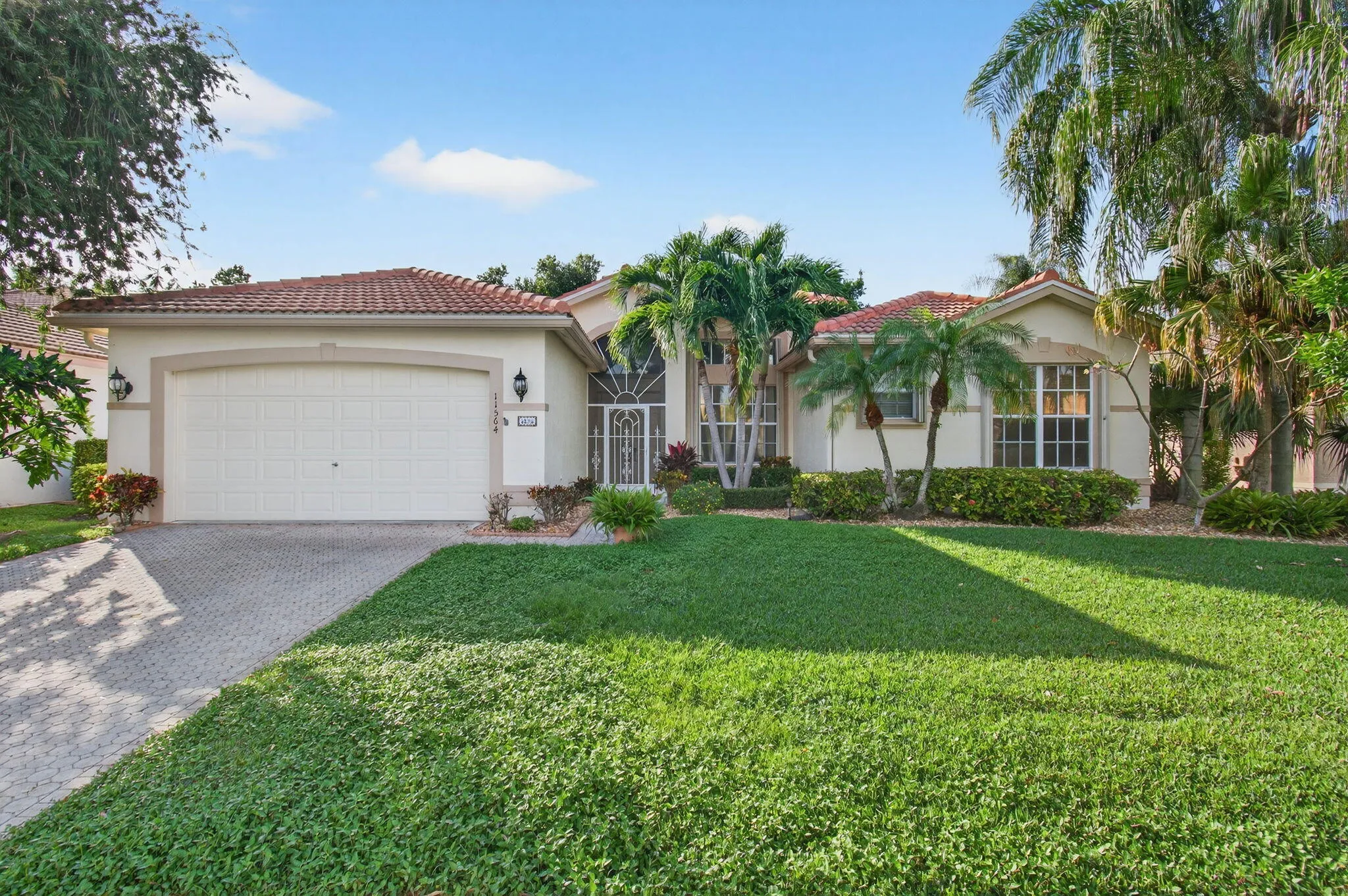 The home's newer roof (2023), in-ground generator and complete storm shutters ensure safe living