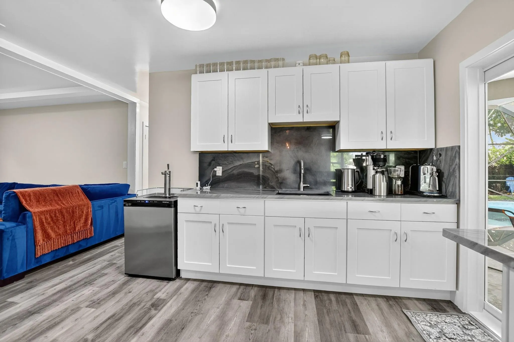 Butler's pantry with a sparkling water dispenser on the left!
