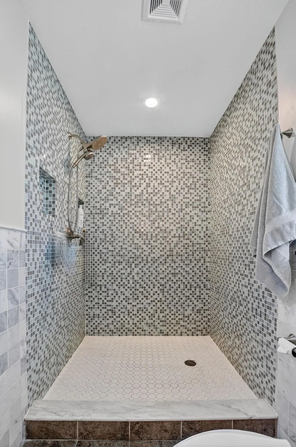 Beautiful tile work in the shower enclosure