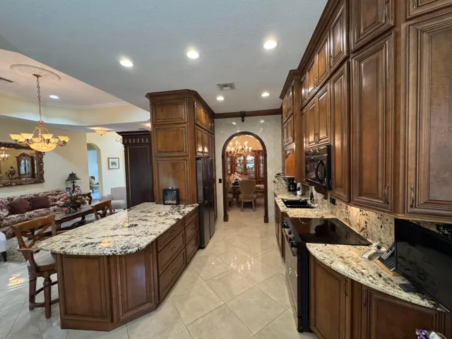 Rmodeled Kitchen Cabinets to ceiling.