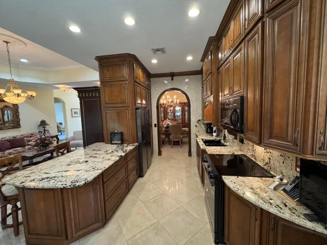 Kitchen with granite built in pantry