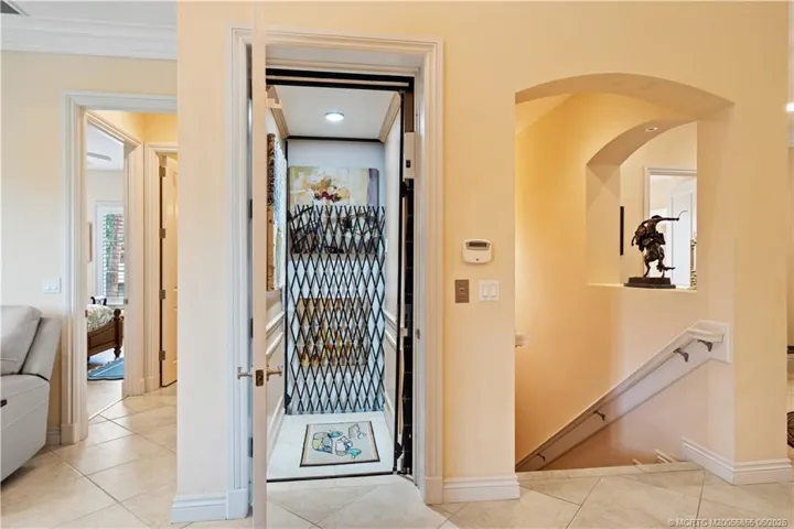 or take the elevator down to the 2-car garage