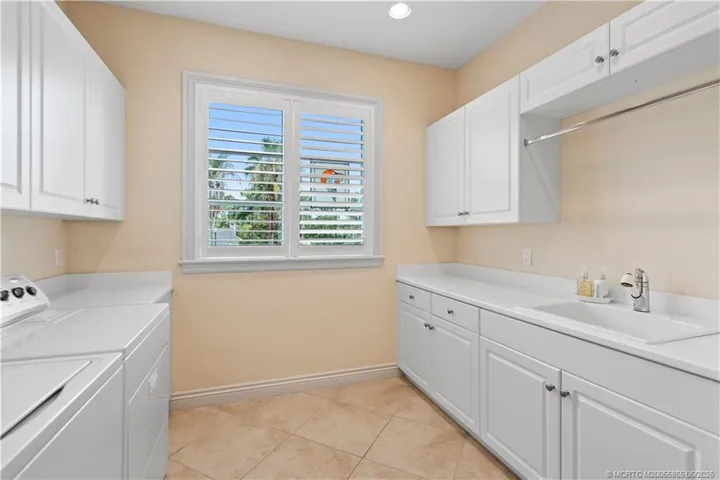Oversized Laundry Room with Sink