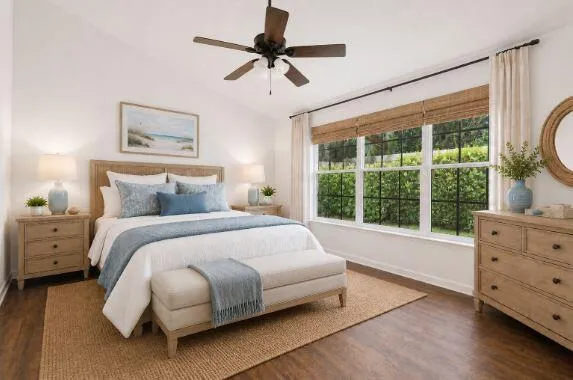 Master bedroom - virtually staged and with greenery in the backyard