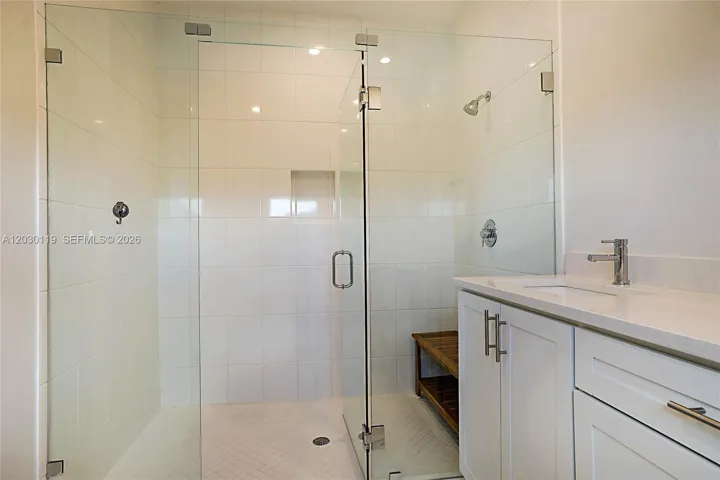 Primary Bathroom with Dual Sinks and Shower