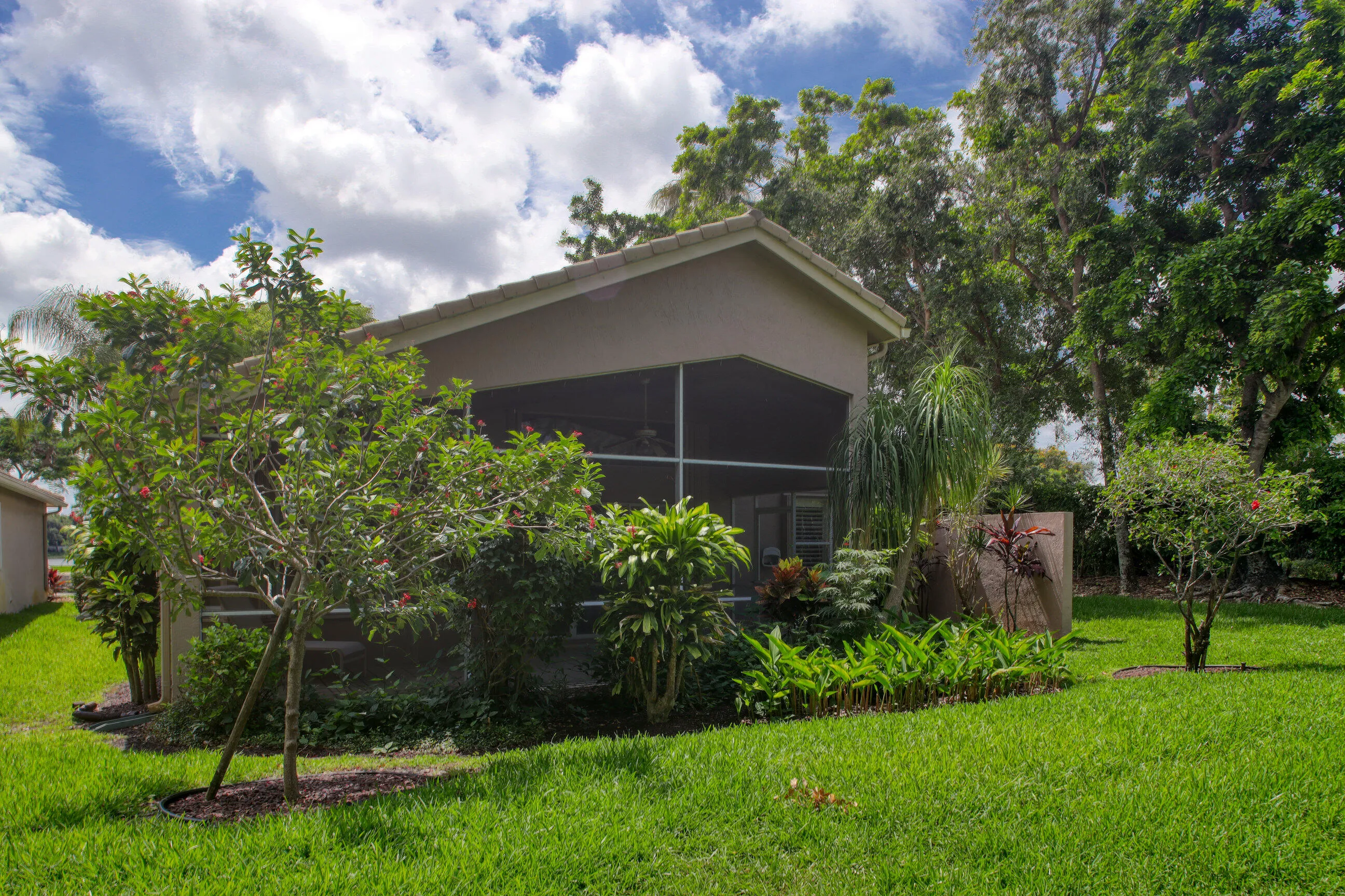 Move in ready home in Bellaggio featuring 2 bedrooms plus den, screened lanai, lake park views and pet friendly living.
