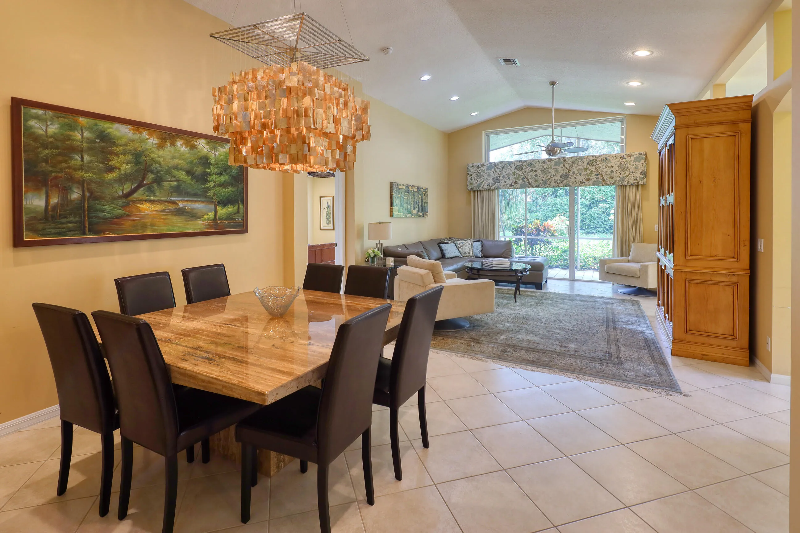 Move in ready home in Bellaggio featuring 2 bedrooms plus den, screened lanai, lake park views and pet friendly living.