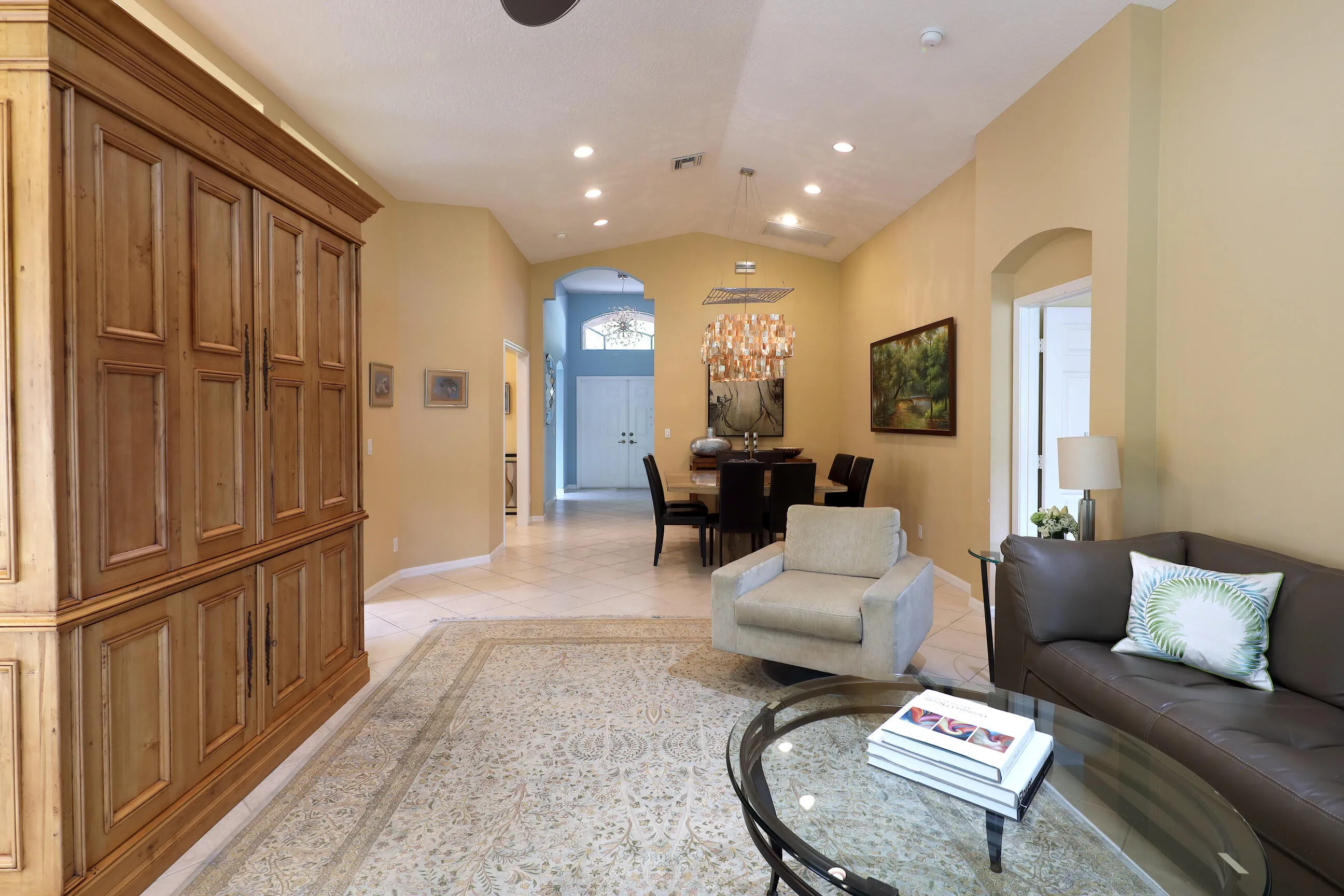 Move in ready home in Bellaggio featuring 2 bedrooms plus den, screened lanai, lake park views and pet friendly living.