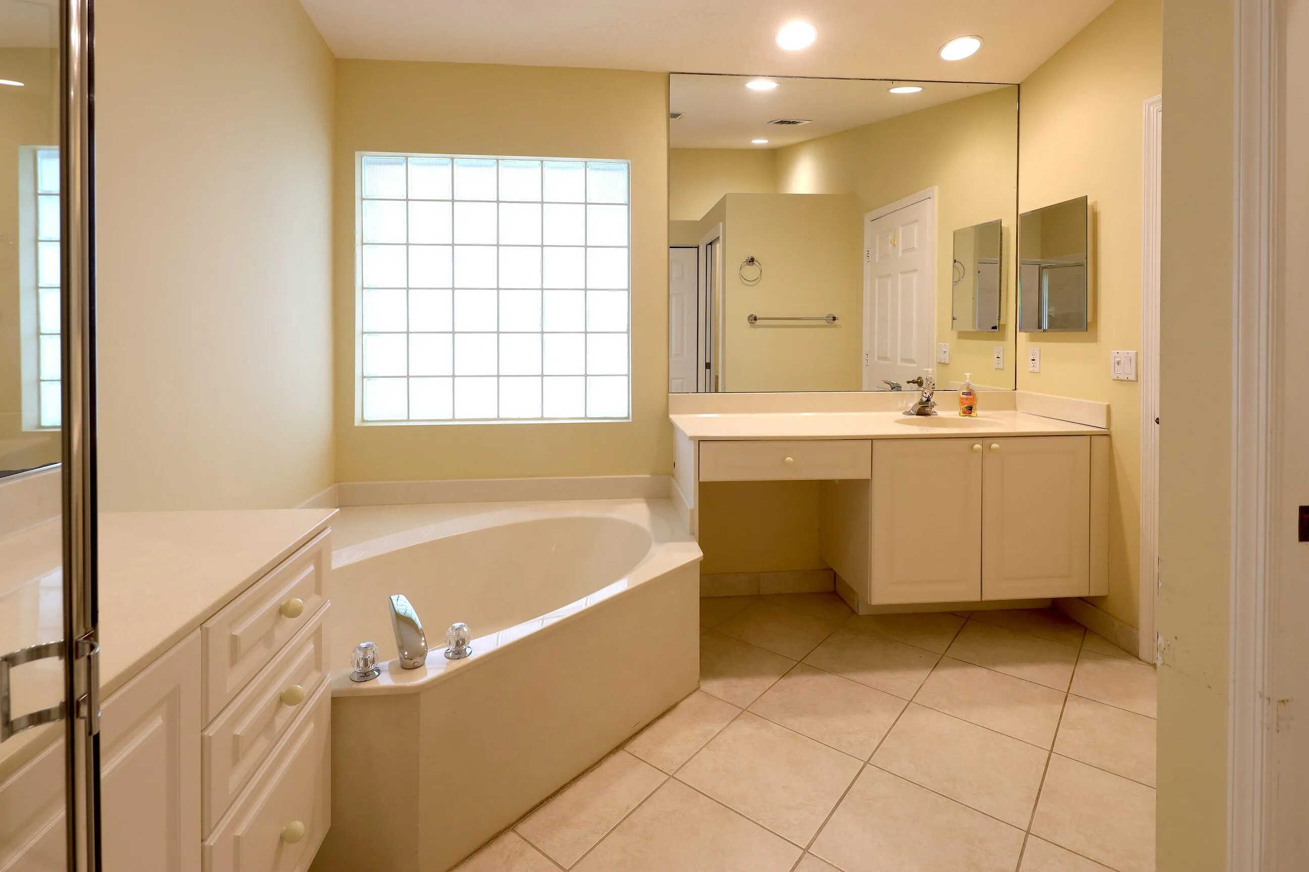 Move in ready home in Bellaggio featuring 2 bedrooms plus den, screened lanai, lake park views and pet friendly living.