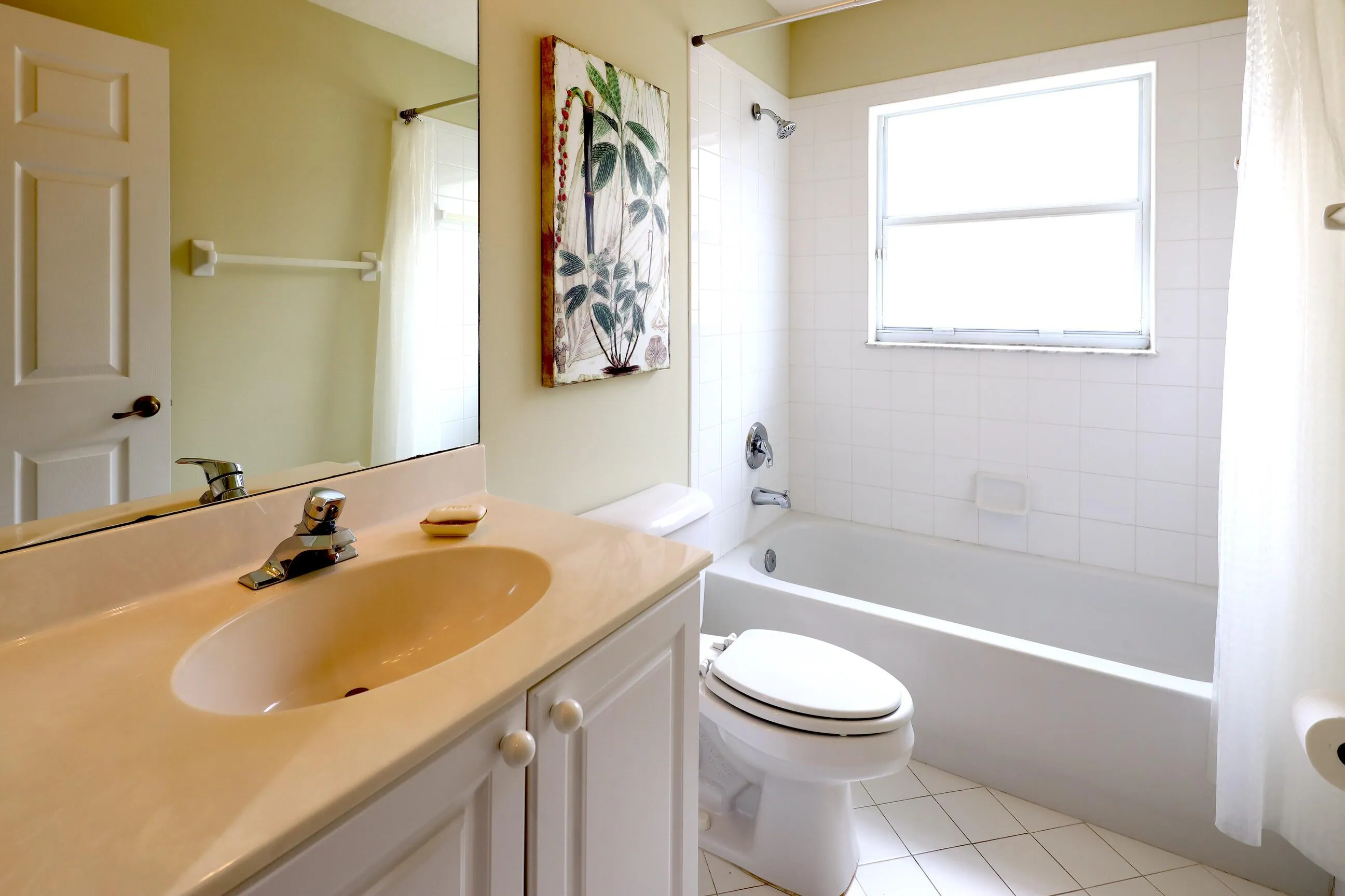 Move in ready home in Bellaggio featuring 2 bedrooms plus den, screened lanai, lake park views and pet friendly living.