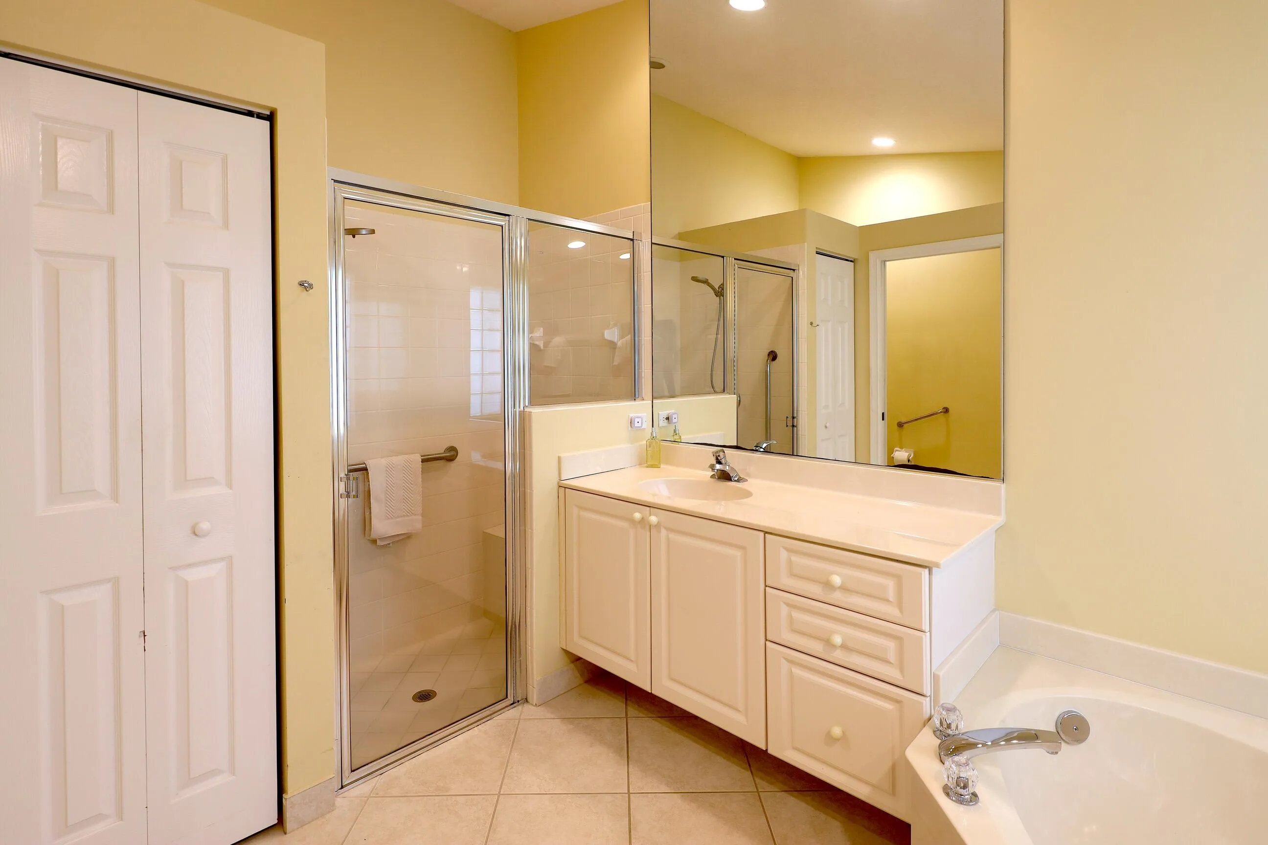 Move in ready home in Bellaggio featuring 2 bedrooms plus den, screened lanai, lake park views and pet friendly living.