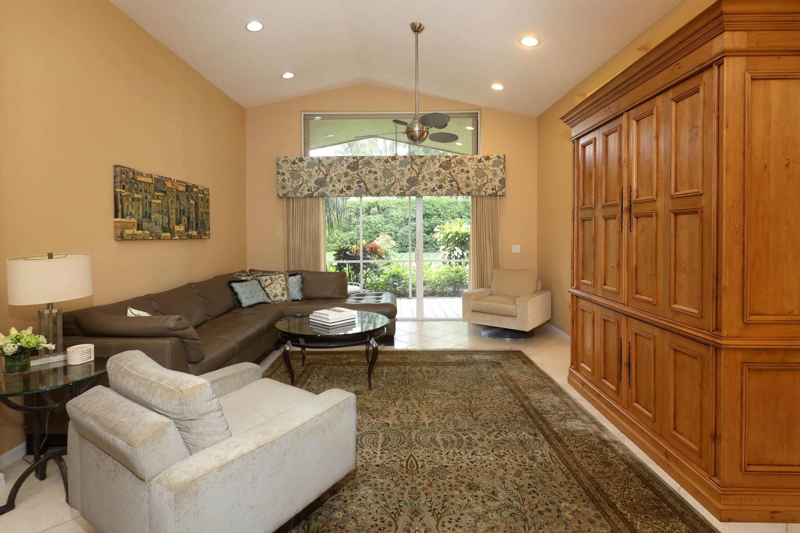 Move in ready home in Bellaggio featuring 2 bedrooms plus den, screened lanai, lake park views and pet friendly living.