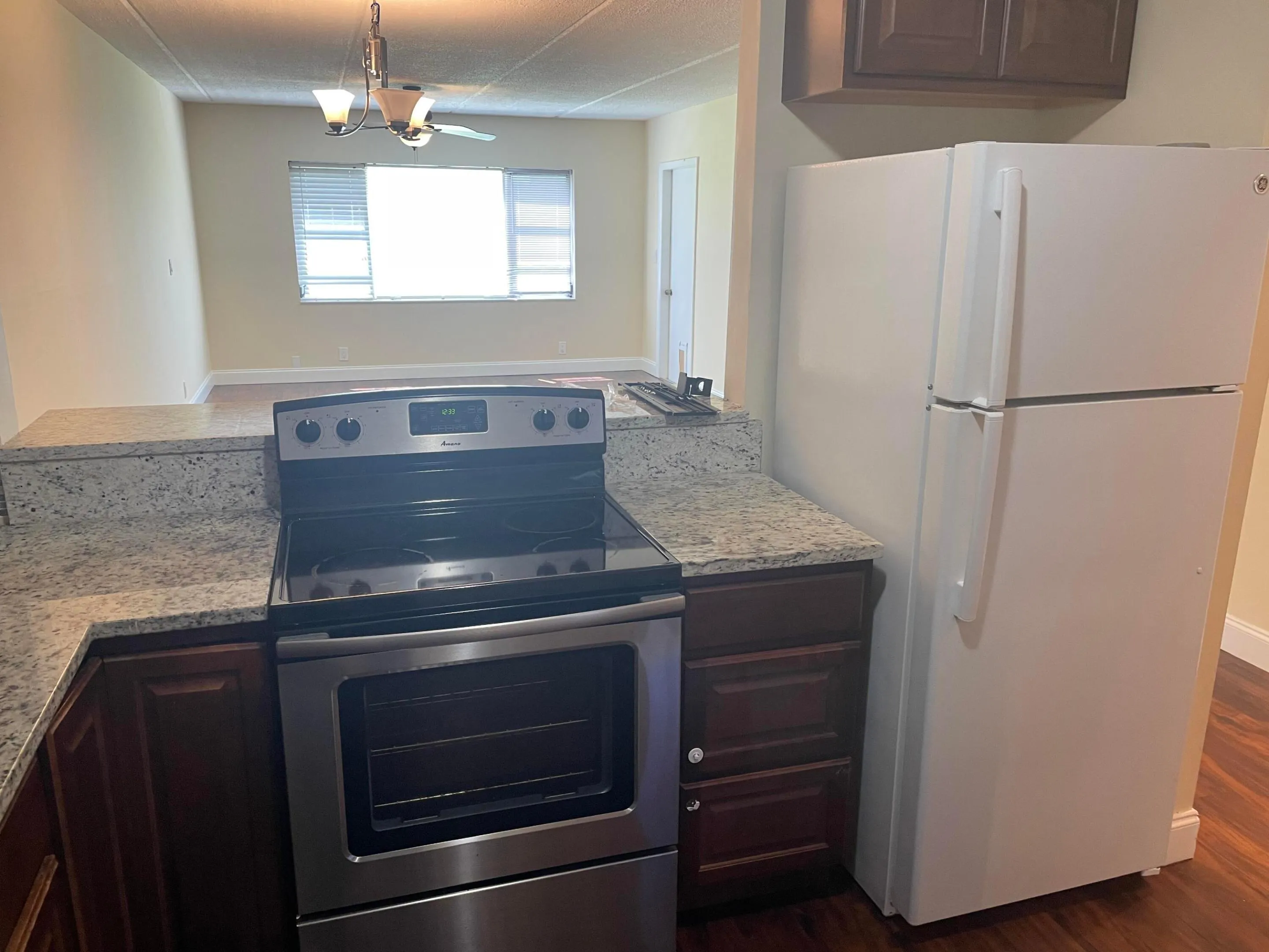Kitchen opens to living room