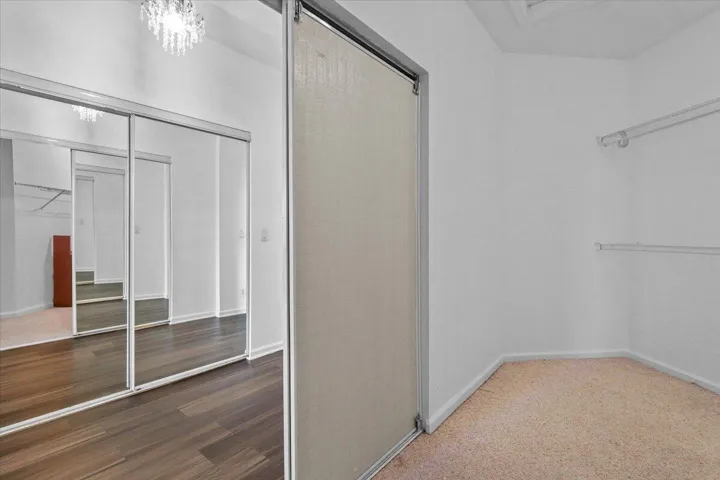 EN-SUITE WALK-IN CLOSET INSIDE THE MASTER BEDROOM SUITE ON SECOND FLOOR