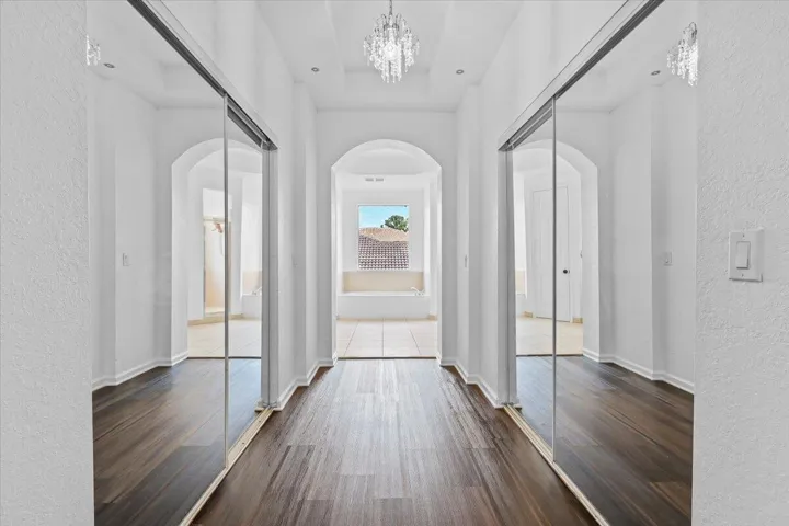EN-SUITE WALK-IN CLOSET INSIDE THE MASTER BEDROOM SUITE ON SECOND FLOOR