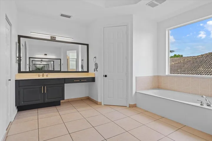 EN-SUITE BATHROOM WITH ROYAL TUB IN MAIN MASTER SUITE ON SECOND FLOOR