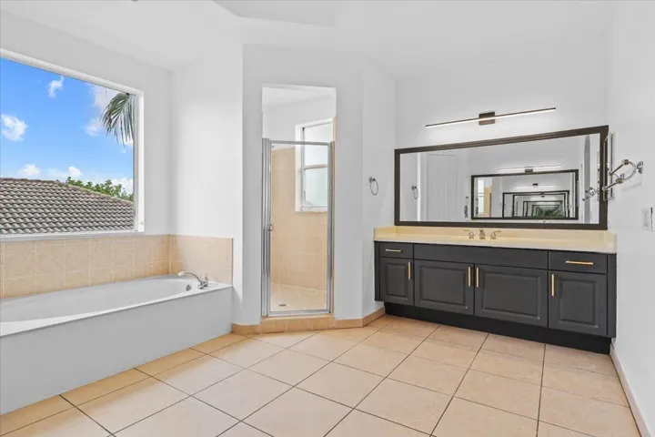 EN-SUITE BATHROOM WITH ROYAL TUB IN MAIN MASTER SUITE ON SECOND FLOOR