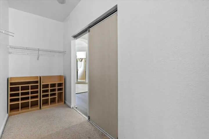 EN-SUITE WALK-IN CLOSET IN MAIN MASTER SUITE ON SECOND FLOOR
