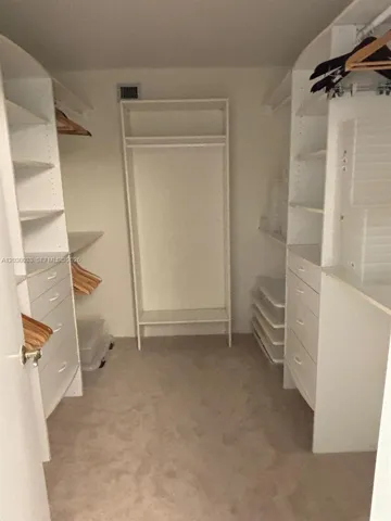 Primary Bedroom Walking Closet