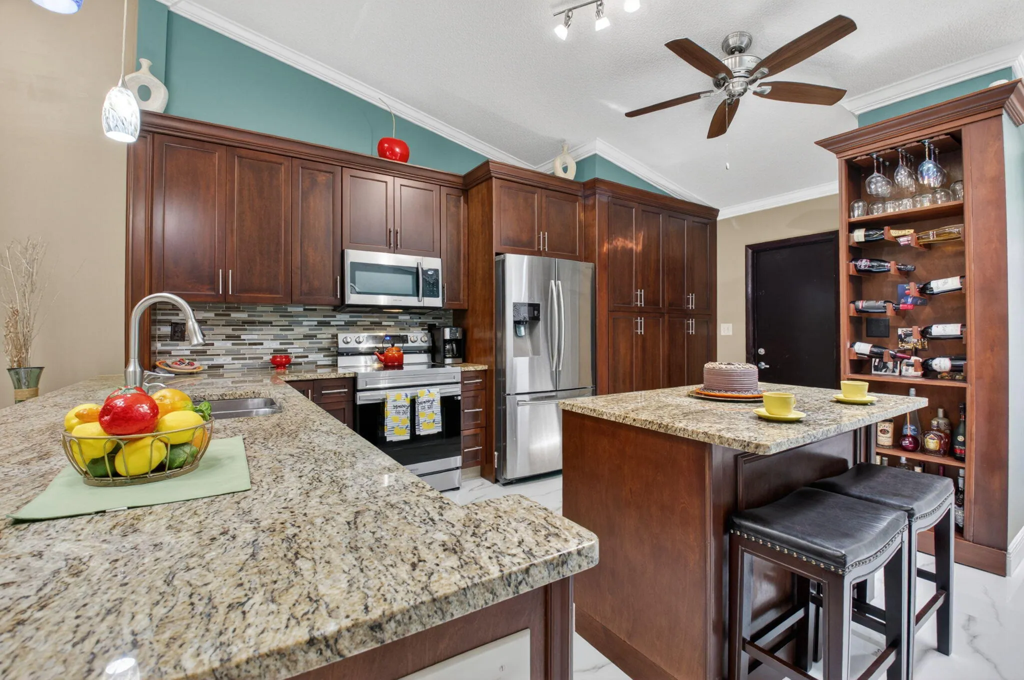 Center island with extra storage and wine bar!