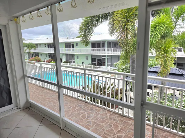 View of the pool from the​​‌​​​​‌​​‌‌​‌‌​​​‌‌​‌​‌​‌​​​‌​​ lanai