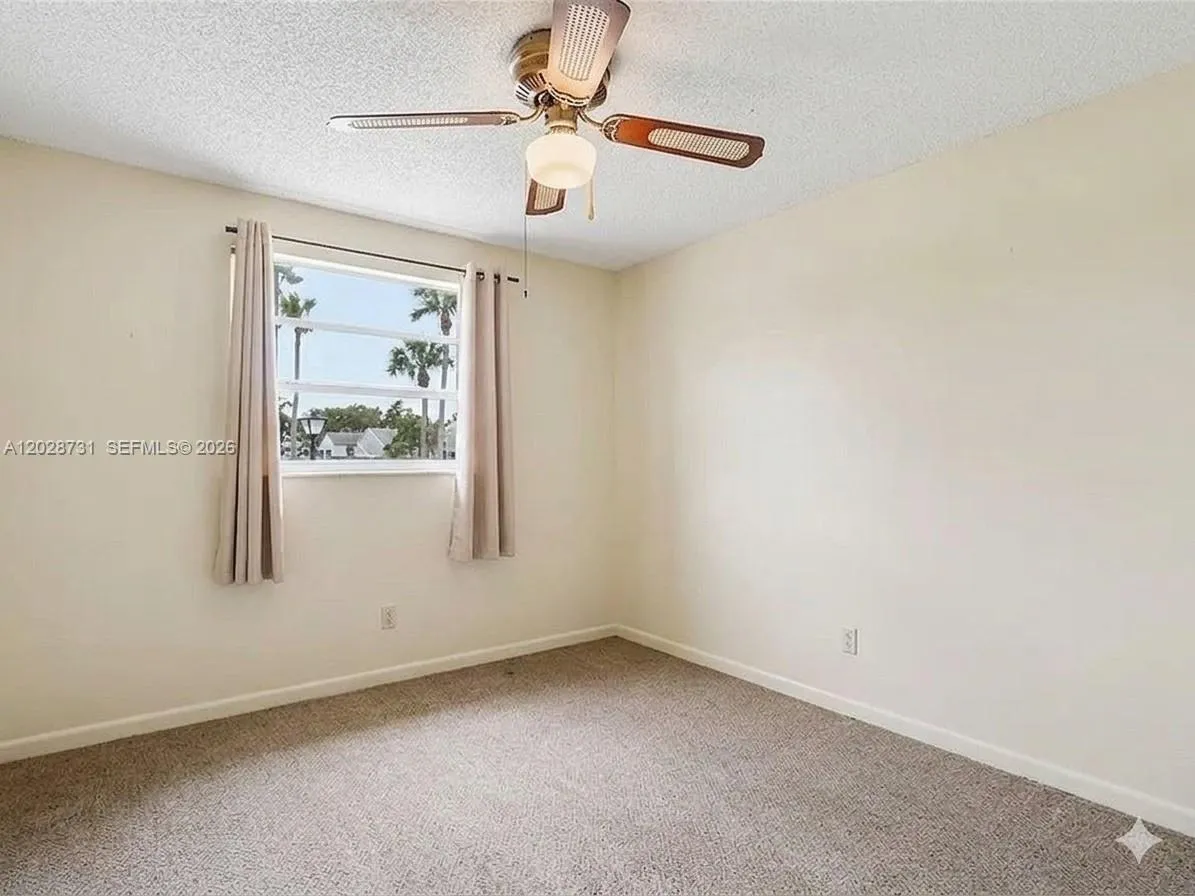 Photo has been virtually enhanced to illustrate the room's potential