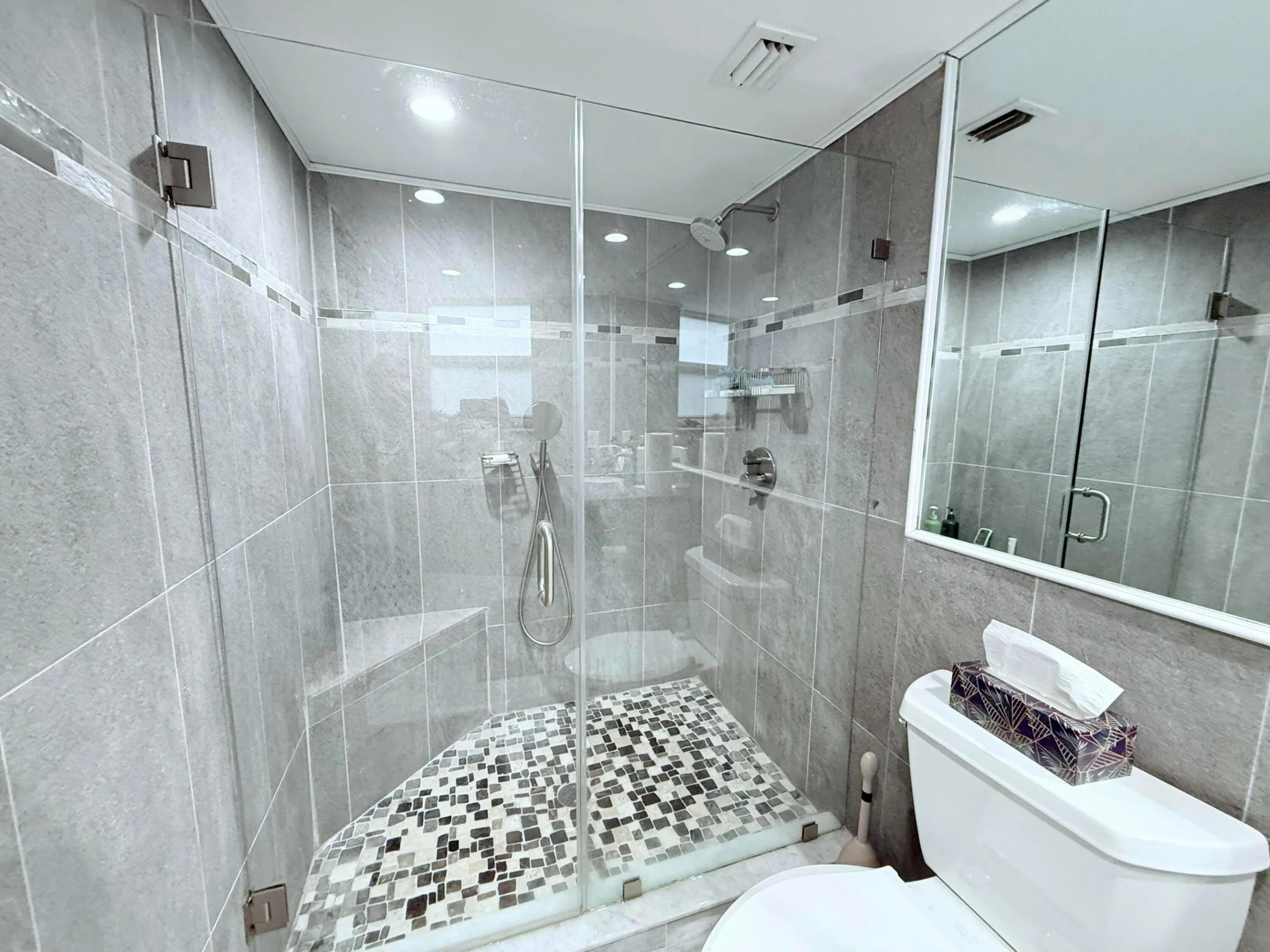 Glass enclosed walk-in shower