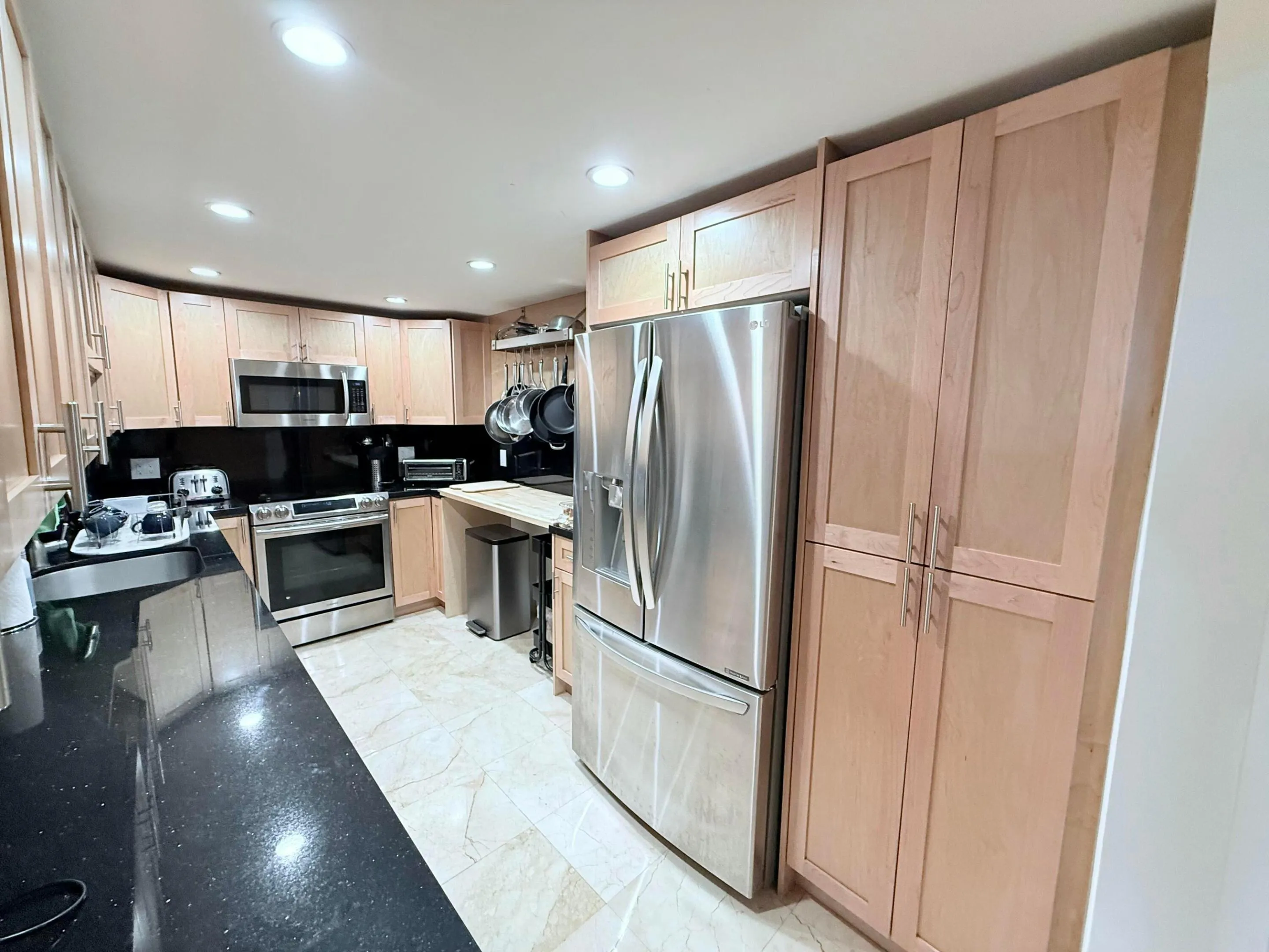 LG refrigerator, Samsung range, oven & microwave, Frigidaire dishwasher