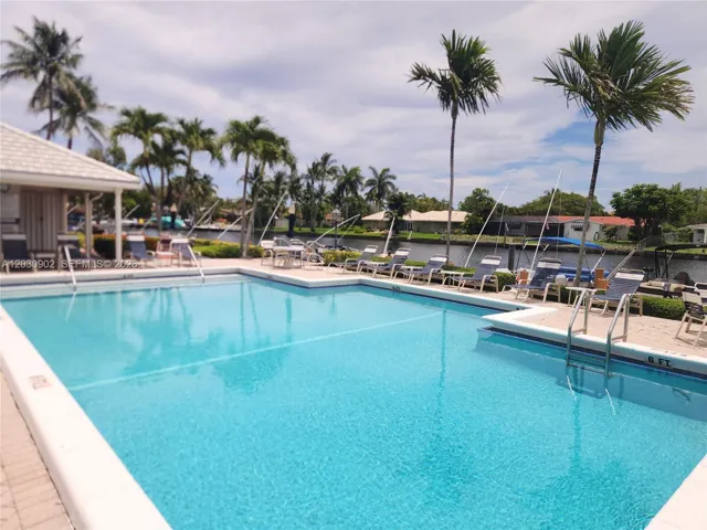 Stunning Community Pool Positioned Along the Canal, Providing a Luxurious Waterfront Lifestyle​​‌​​​​‌​​‌‌​‌‌​​​‌‌​‌​‌​‌​​​‌​​ Setting