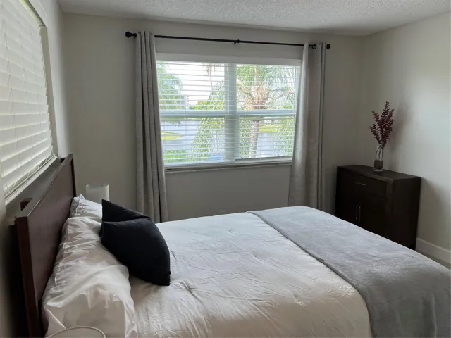 Primary bedroom has nice views of the lake