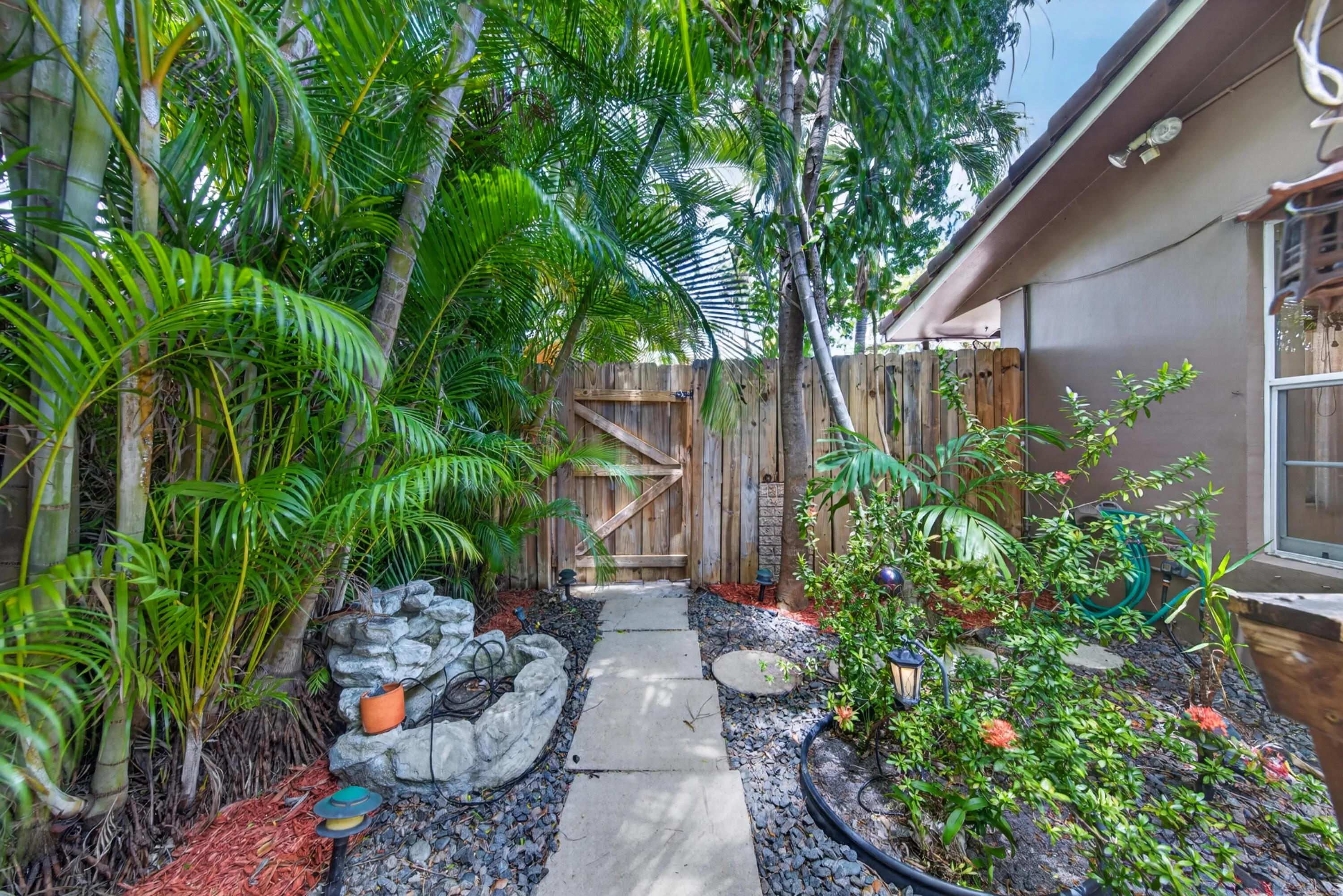 yard to right of home with gate