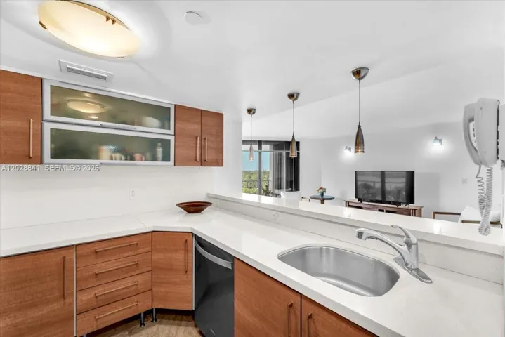 Experience the charm of a beautifully renovated open kitchen, perfect for entertaining friends and whipping up delicious meals.